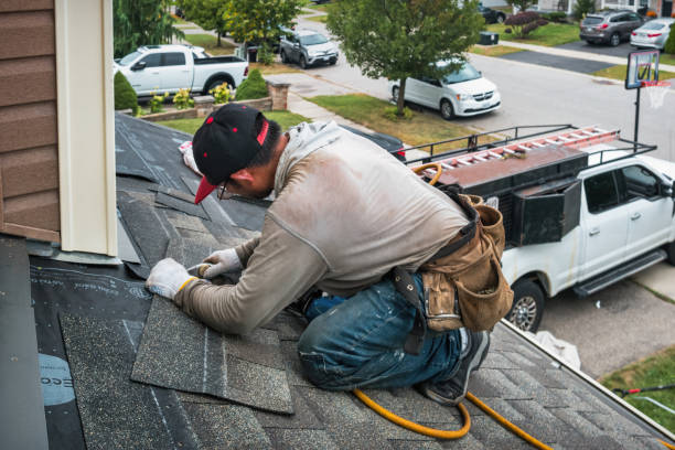 Professional Storm Damage Roof Repair technician working in Dublin, PA